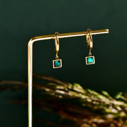 Steel drop hoop earring with green square stone attached