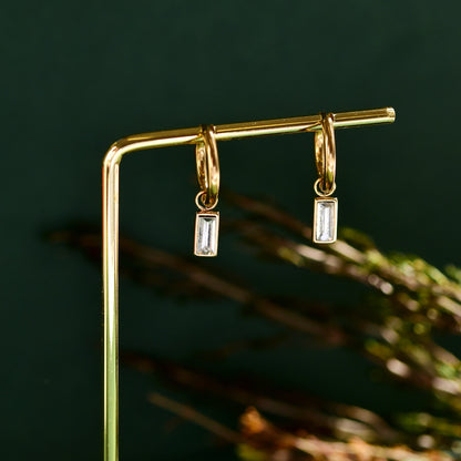 Steel hoop with stone cut attachment earring